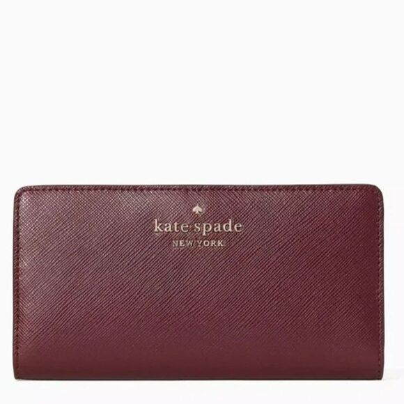 kate spade Handbags - Kate Spade Staci Large Slim Bifold Wallet in Plum Pie NWT